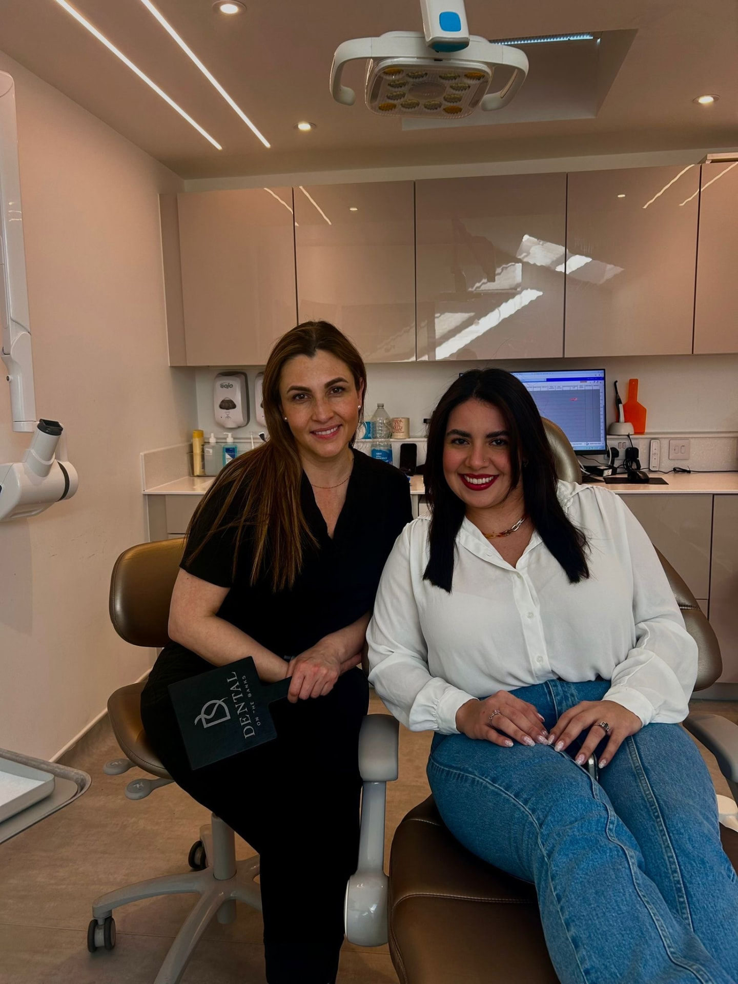 Patient with her dentist at Dental On The Banks
